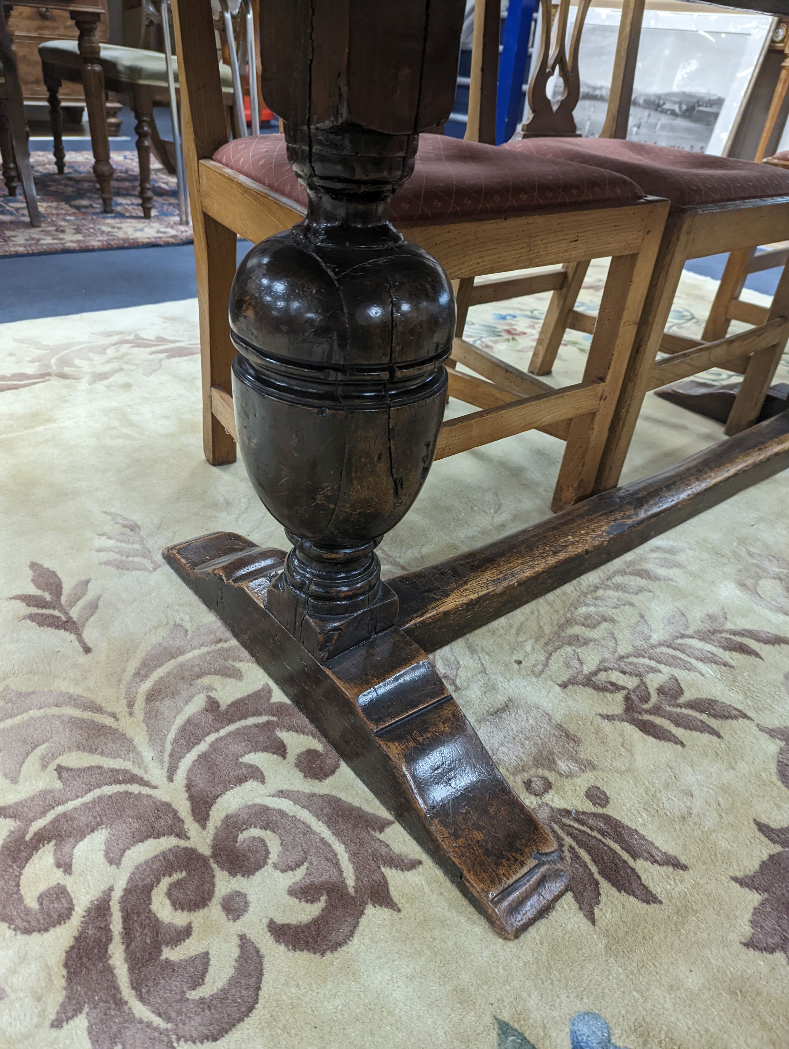 A 17th century style rectangular oak refectory dining table. Length -183cm, Width-91cm, Height-74cm.